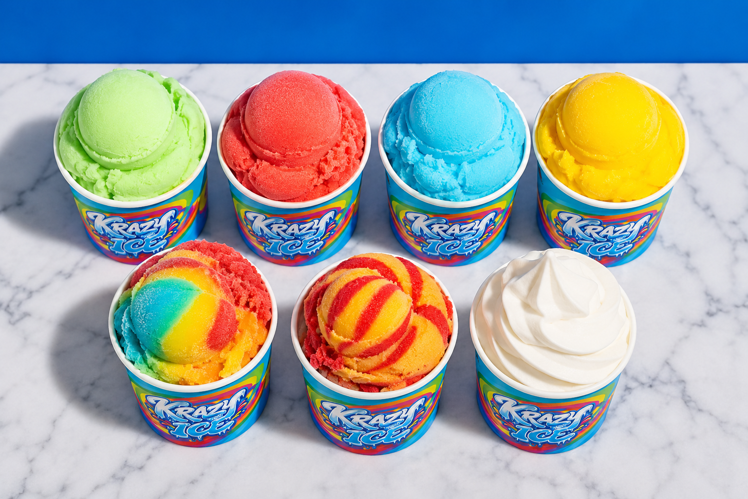 Seven cups of colorful Krazy Ice flavors including green, red, blue, yellow, rainbow swirl and soft-serve